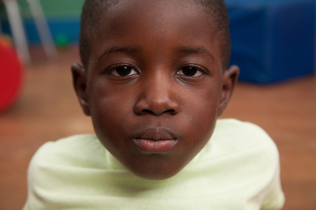 Boy looking with  his mouth closed