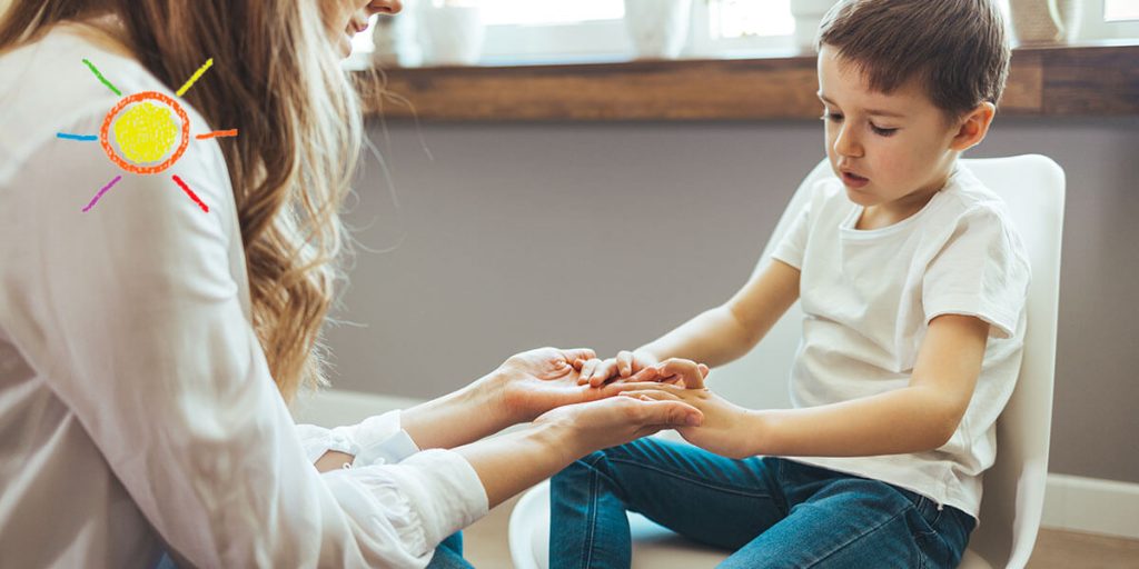 Therapist with child who has anxiety and autism