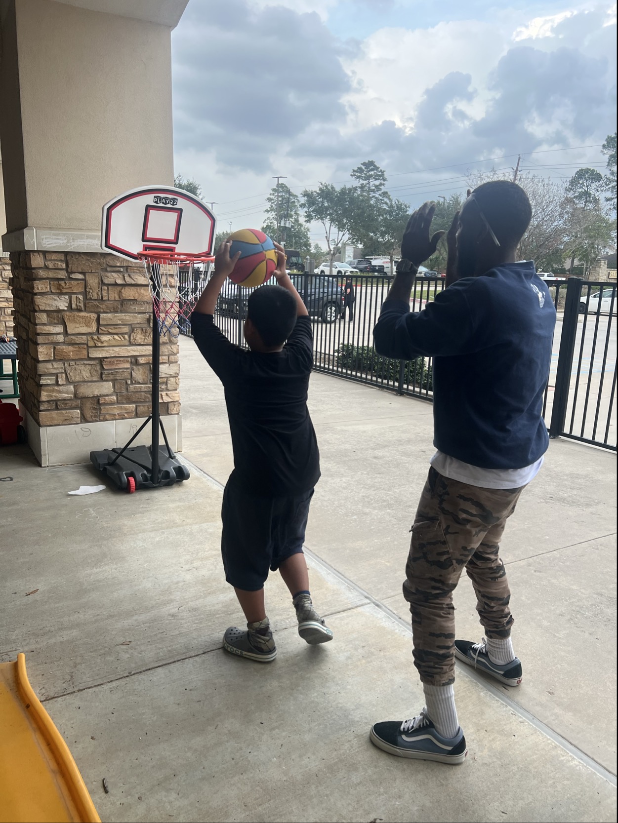 A Spectrum of Hope team member working with a child in session